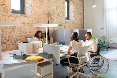 Diverse team of professionals working together in a stylish modern office.